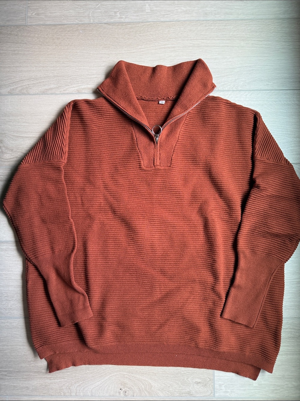 Rust-colored quarter zip textured sweater, size M